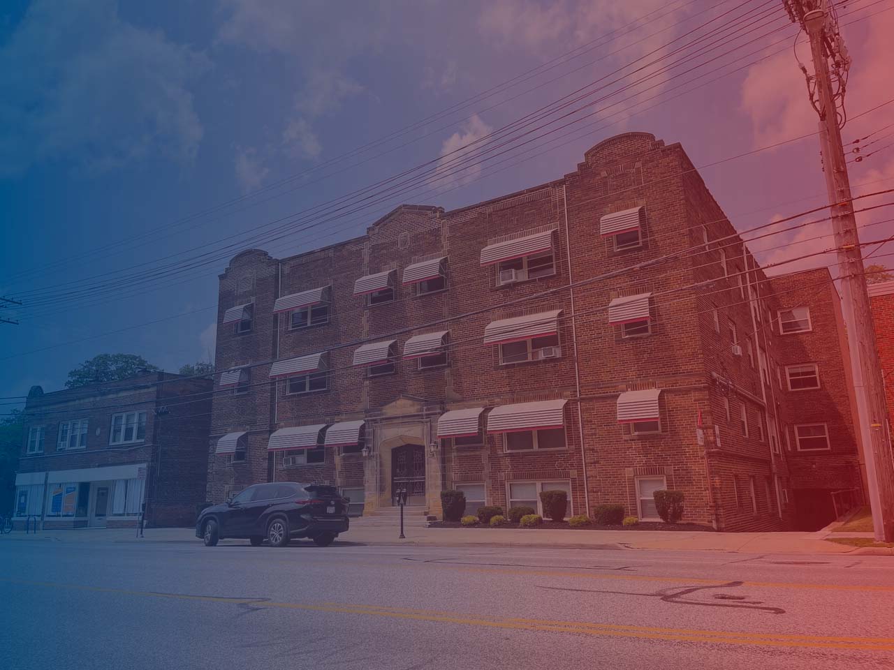 Photo of 16414 Madison St, Cleveland, OH with red and blue gradient overlay.